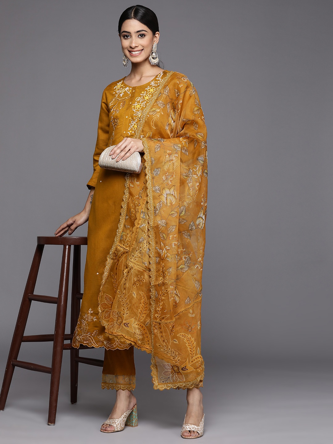 Indo Era Women Mustard Yellow Floral Embroidered Thread Work Kurta with Trousers & Dupatta
Indo Era Women Mustard Yellow Floral Embroidered Thread Work Kurta with Trousers & Dupatta
