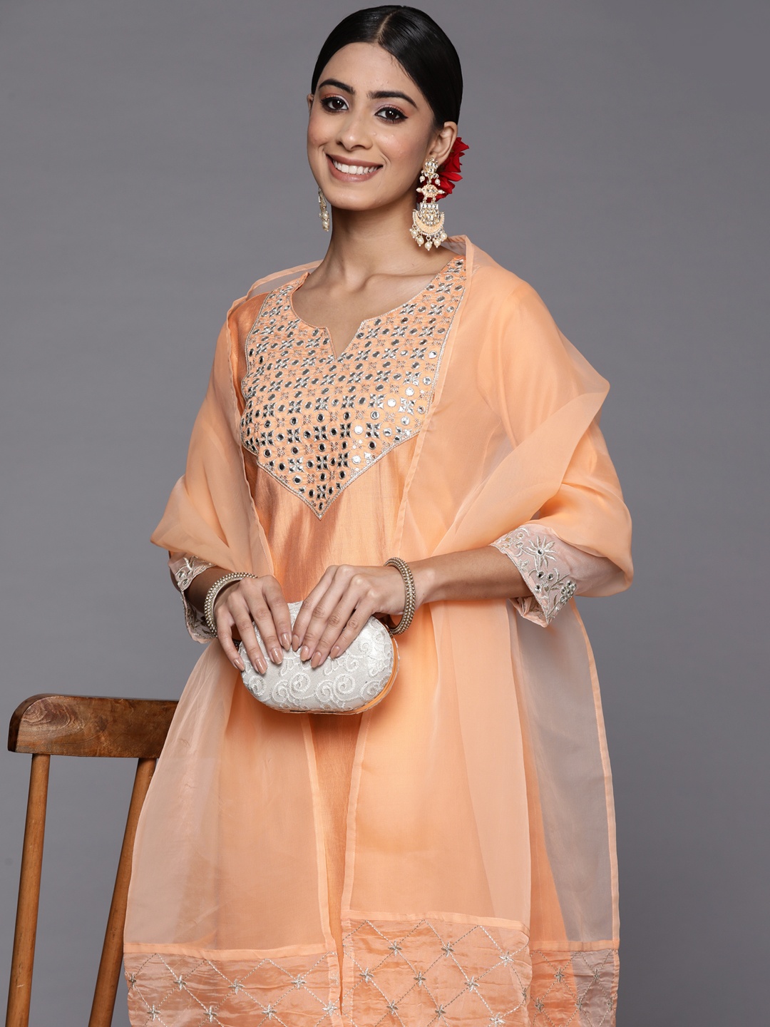 Indo Era Women Peach-Coloured Embroidered Mirror Work Liva Kurta with Trousers & With Dupatta
Indo Era Women Peach-Coloured Embroidered Mirror Work Liva Kurta with Trousers & With Dupatta