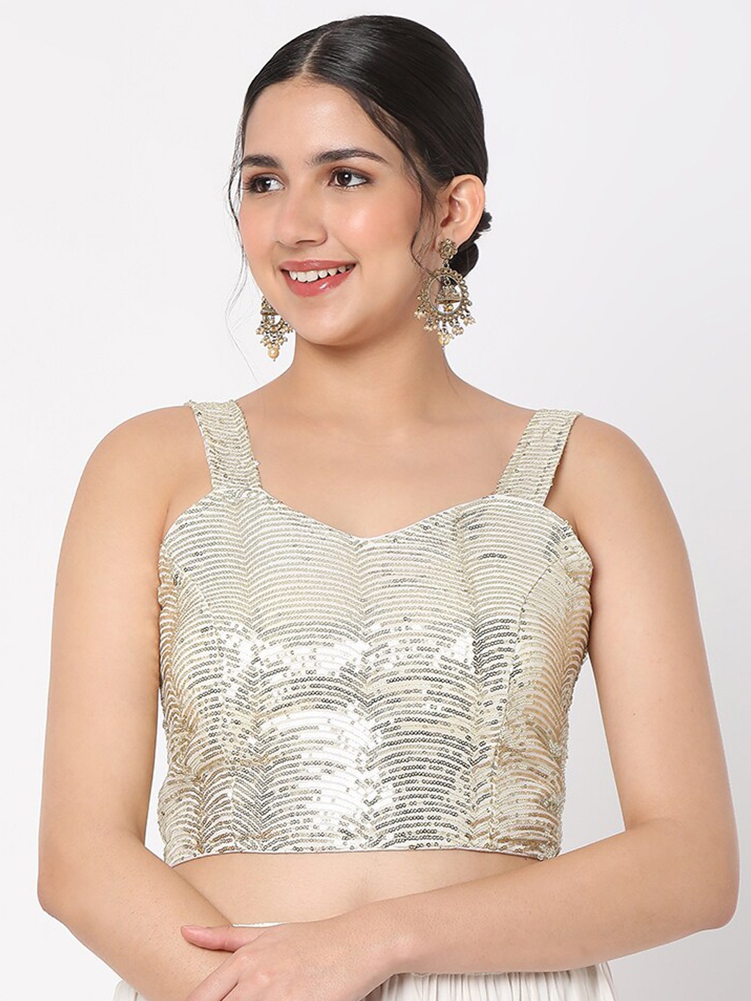 SALWAR STUDIO Women Silver Embroidered Georgette Sleeveless Readymade Saree Blouse
SALWAR STUDIO Women Silver Embroidered Georgette Sleeveless Readymade Saree Blouse