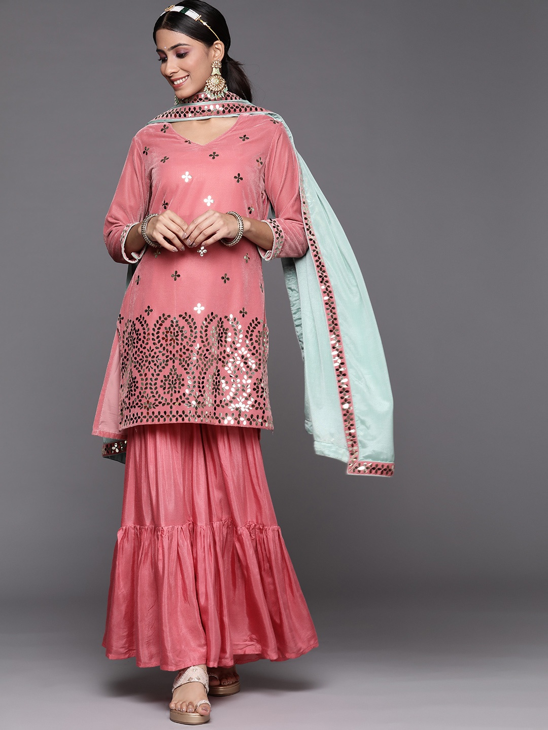Inddus Women Pink Ethnic Motifs Embroidered Velvet Kurta with Sharara & Dupatta
Inddus Women Pink Ethnic Motifs Embroidered Velvet Kurta with Sharara & Dupatta