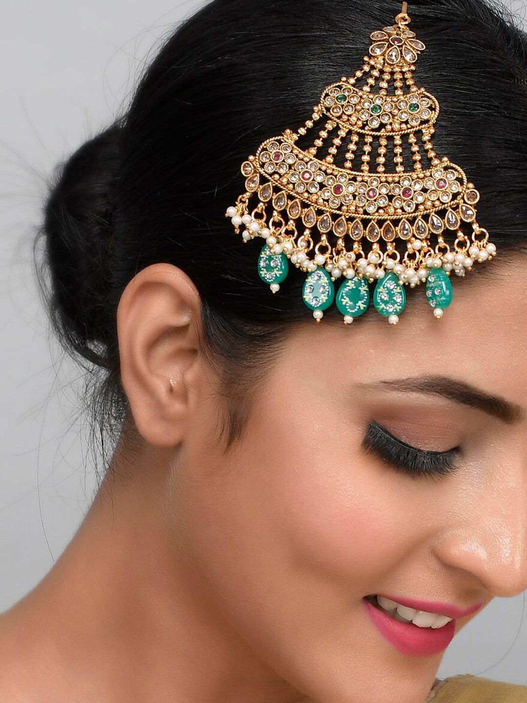 AQUASTREET JEWELS Gold-Plated White & Green AD-Studded & Beaded Bridal Jhumar Passa
AQUASTREET JEWELS Gold-Plated White & Green AD-Studded & Beaded Bridal Jhumar Passa