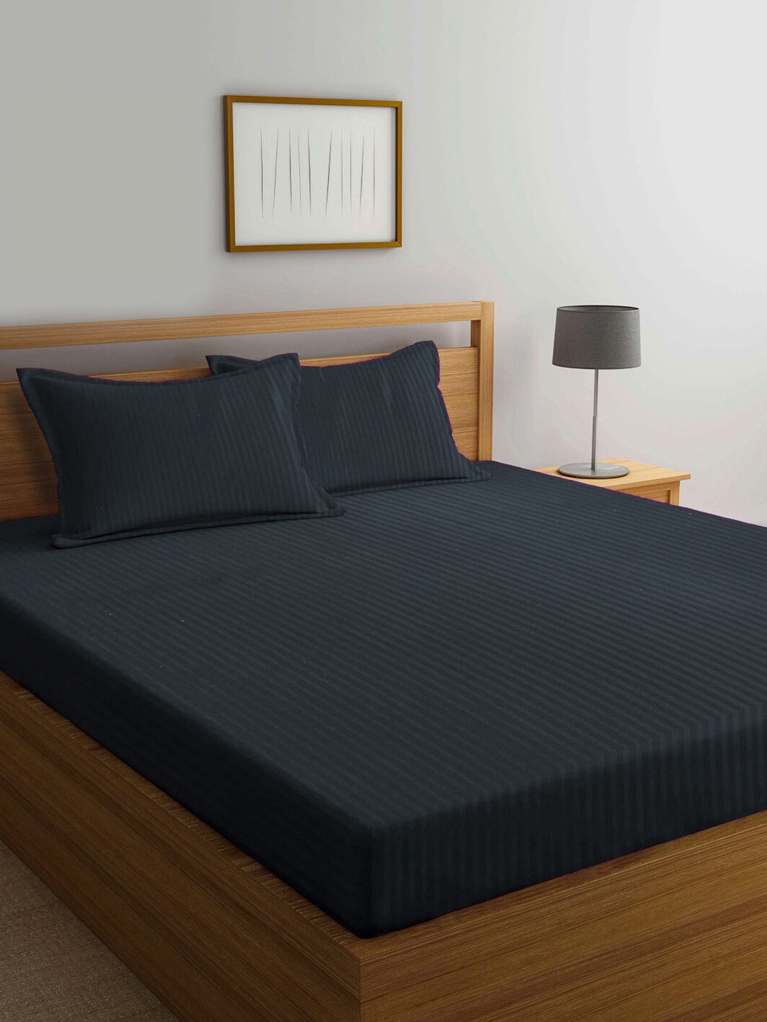 KLOTTHE Black Striped Cotton Blend Fitted Super King Double Bedsheet with 2 Pillow covers
KLOTTHE Black Striped Cotton Blend Fitted Super King Double Bedsheet with 2 Pillow covers