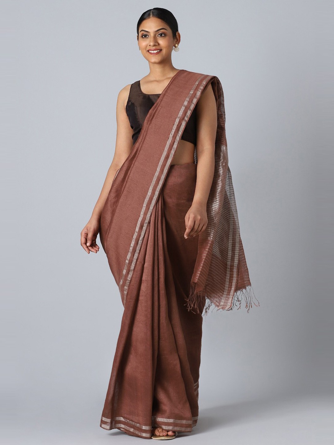 Taneira Women Brown & Silver-Toned Zari Pure Silk Saree With Unstitched Blouse Piece
Taneira Women Brown & Silver-Toned Zari Pure Silk Saree With Unstitched Blouse Piece