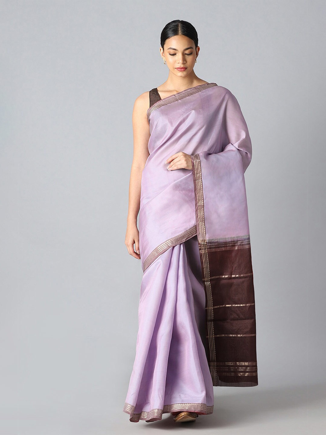 Taneira Violet & Gold-Toned Embroidered Pure Silk Saree With Unstitched Blouse Piece
Taneira Violet & Gold-Toned Embroidered Pure Silk Saree With Unstitched Blouse Piece