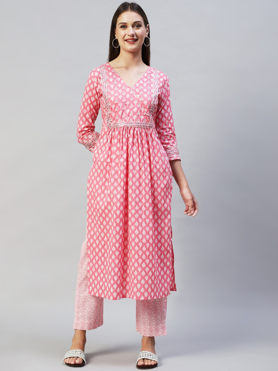 FASHOR Women Pink Ethnic Motifs Embroidered Sequinned Pure Cotton Kurta with Trousers
FASHOR Women Pink Ethnic Motifs Embroidered Sequinned Pure Cotton Kurta with Trousers