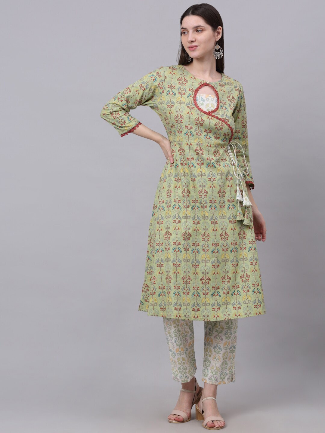 KALINI Women Green Ethnic Motifs Printed Angrakha Thread Work Pure Cotton Kurti with Trousers
KALINI Women Green Ethnic Motifs Printed Angrakha Thread Work Pure Cotton Kurti with Trousers