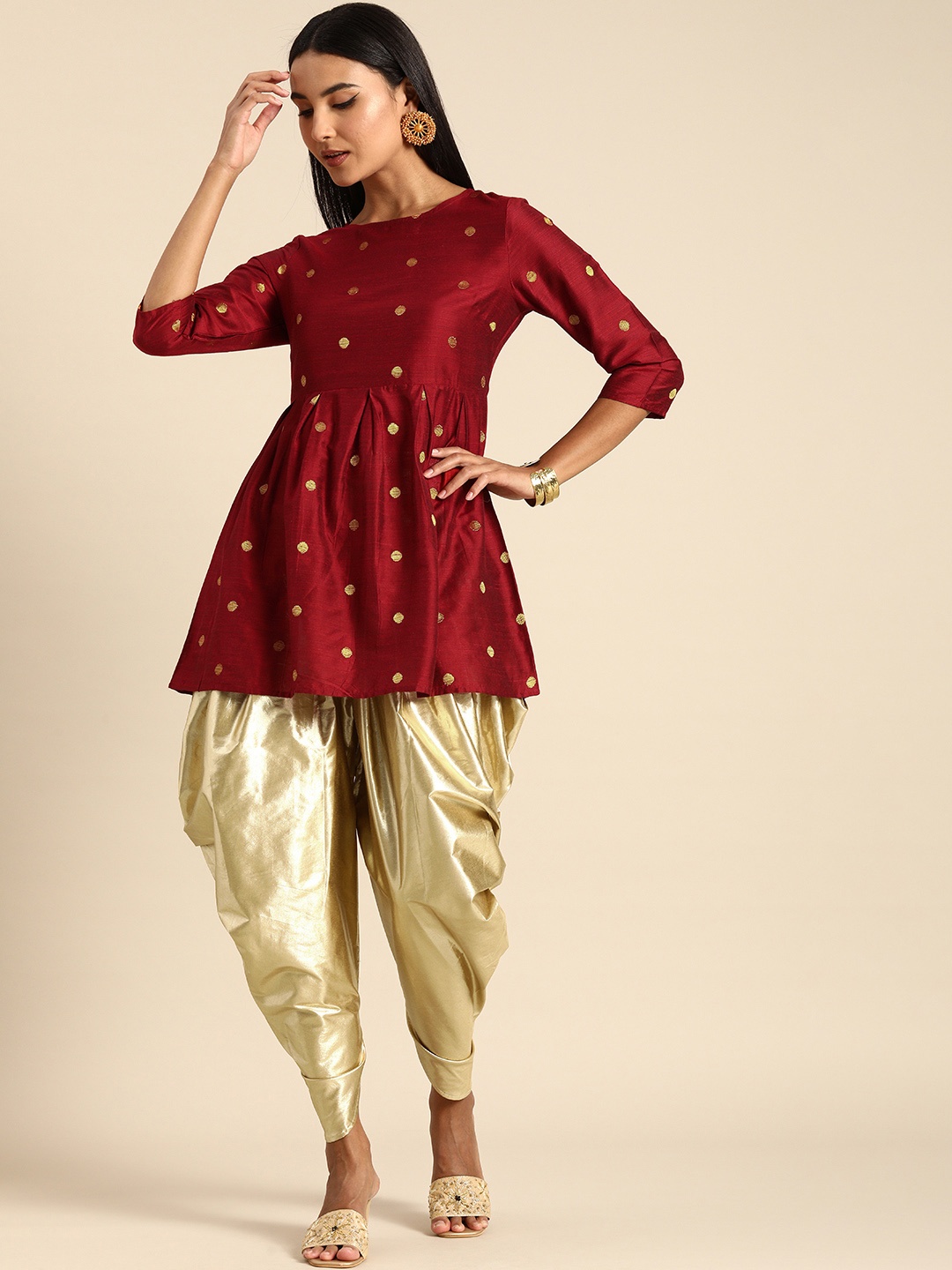 Anouk Women Maroon & Gold-Toned Geometric Woven Design Pleated Kurti with Dhoti Pants
Anouk Women Maroon & Gold-Toned Geometric Woven Design Pleated Kurti with Dhoti Pants