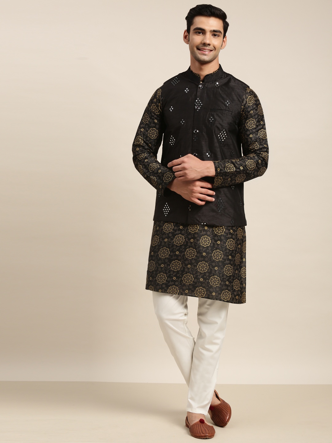 SOJANYA Men Black Floral Printed Mirror Work Kurta with Churidar & Nehru Jacket
SOJANYA Men Black Floral Printed Mirror Work Kurta with Churidar & Nehru Jacket