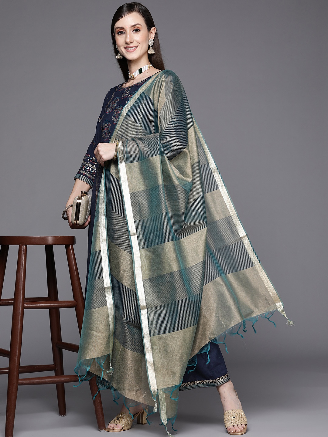 Indo Era Women Navy Blue Ethnic Motifs Printed Panelled Kurta with Palazzos & Dupatta
Indo Era Women Navy Blue Ethnic Motifs Printed Panelled Kurta with Palazzos & Dupatta