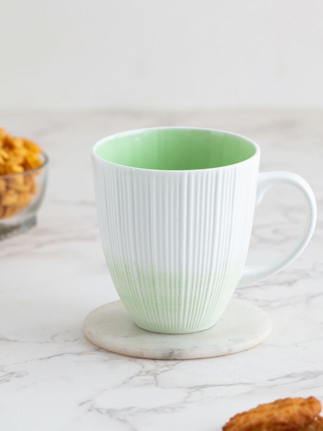 CLAY CRAFT Set of 2 White & Green Dishwasher &Microwave Safe Ceramic Glossy Mugs 350 ml
CLAY CRAFT Set of 2 White & Green Dishwasher &Microwave Safe Ceramic Glossy Mugs 350 ml