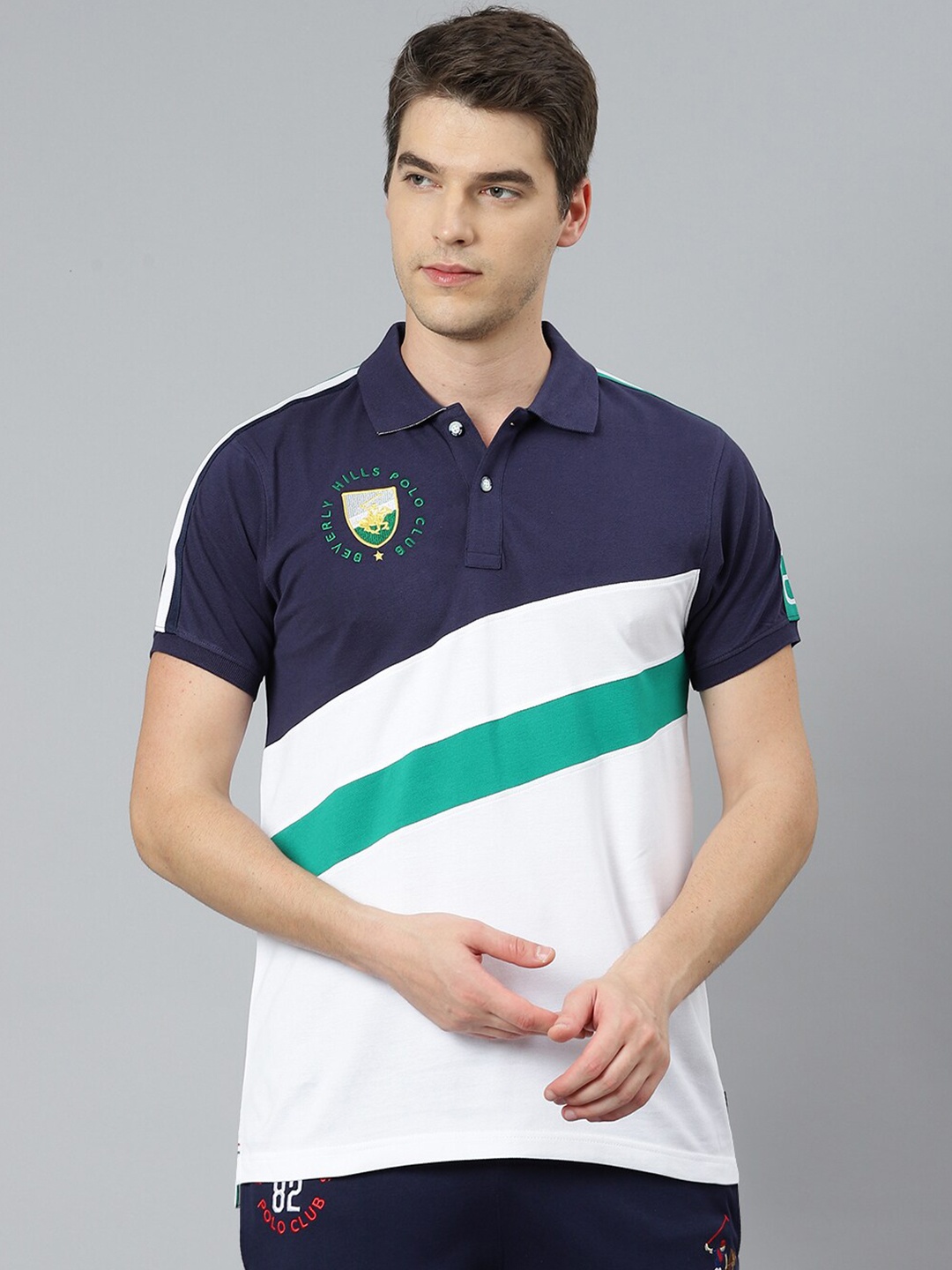 Beverly Hills Polo Club Men Navy Blue & White Colourblocked Cotton Polo Collar T-shirt
Beverly Hills Polo Club Men Navy Blue & White Colourblocked Cotton Polo Collar T-shirt