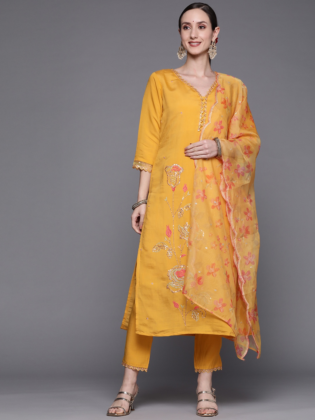 Indo Era Women Mustard Yellow Floral Embroidered Sequinned Kurta with Trousers & With Dupatta
Indo Era Women Mustard Yellow Floral Embroidered Sequinned Kurta with Trousers & With Dupatta