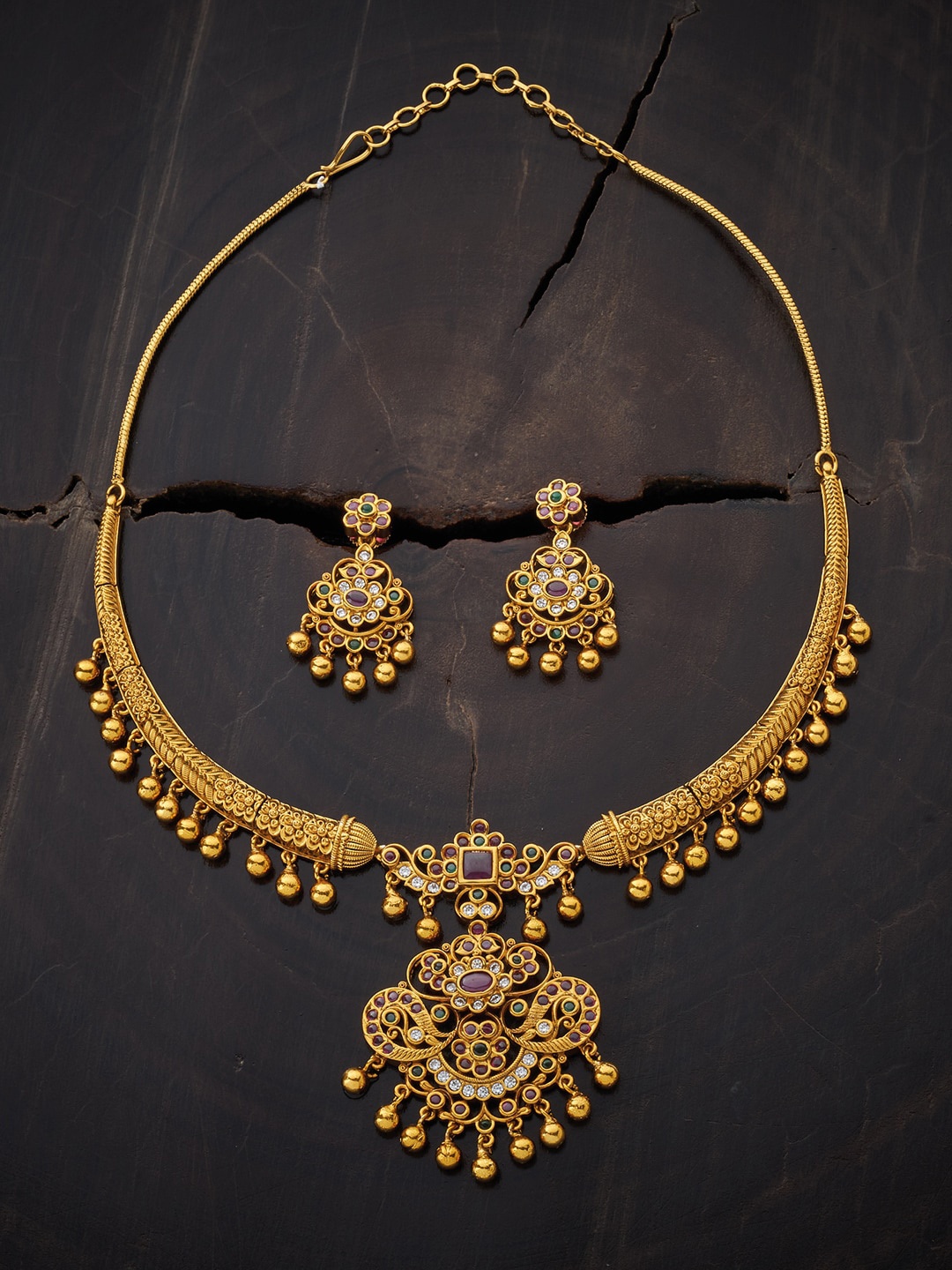 Kushal's Fashion Jewellery Gold-Tone Ruby Red & Green Stone-Studded & Beaded Jewellery Set
Kushal's Fashion Jewellery Gold-Tone Ruby Red & Green Stone-Studded & Beaded Jewellery Set