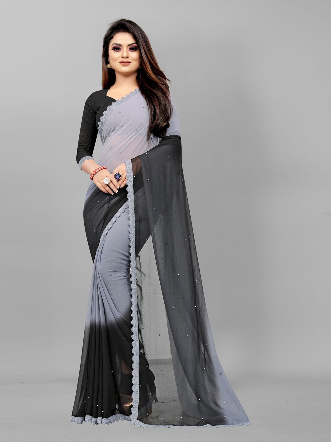 Queenswear Creation Grey & Black Colourblocked Beads and Stones Pure Georgette Saree
Queenswear Creation Grey & Black Colourblocked Beads and Stones Pure Georgette Saree
