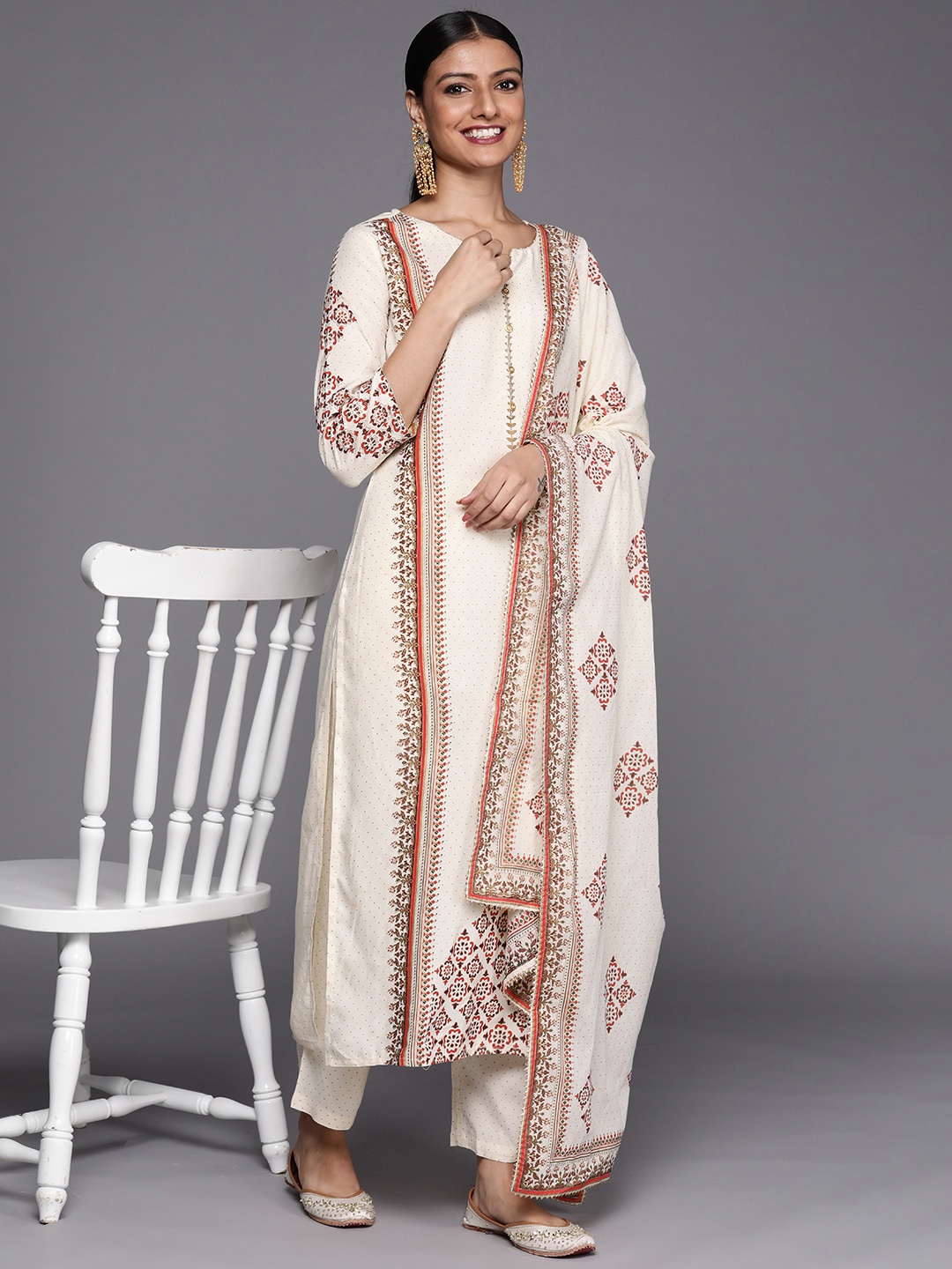 Libas Women Cream-Coloured Ethnic Motifs Printed Panelled Kurta with Trousers & Dupatta
Libas Women Cream-Coloured Ethnic Motifs Printed Panelled Kurta with Trousers & Dupatta