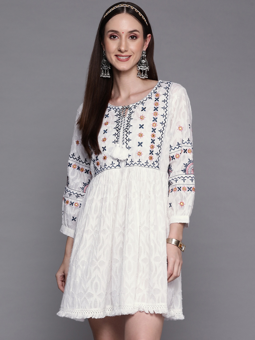 Indo Era White & Navy Blue Schiffli Embroidered Tie-Up Neck Ethnic A-Line Mini Dress
Indo Era White & Navy Blue Schiffli Embroidered Tie-Up Neck Ethnic A-Line Mini Dress