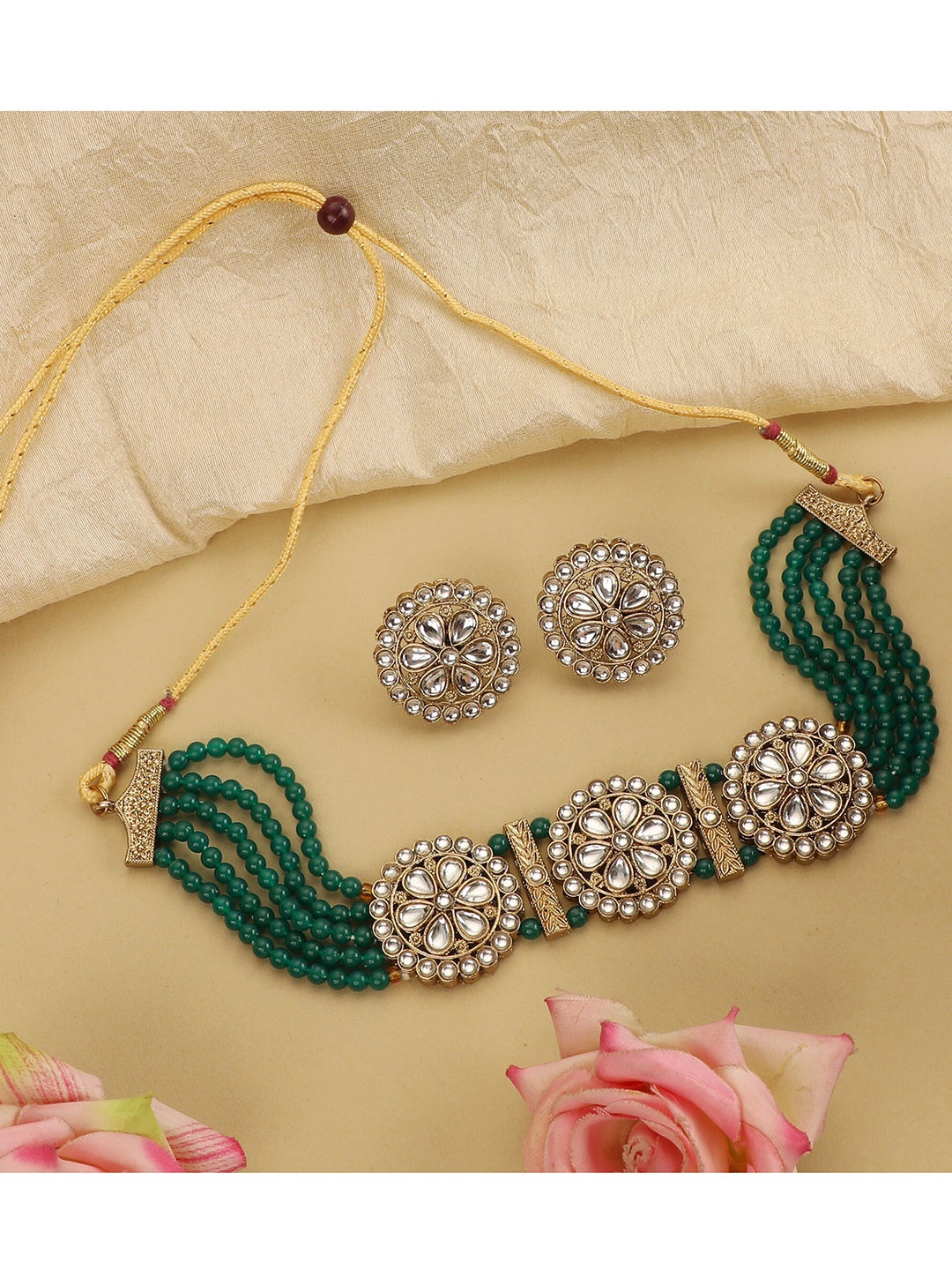 ZaffreCollections Women Gold-Plated Green & White Crystal-Studded & Beaded Jewellery Set
ZaffreCollections Women Gold-Plated Green & White Crystal-Studded & Beaded Jewellery Set