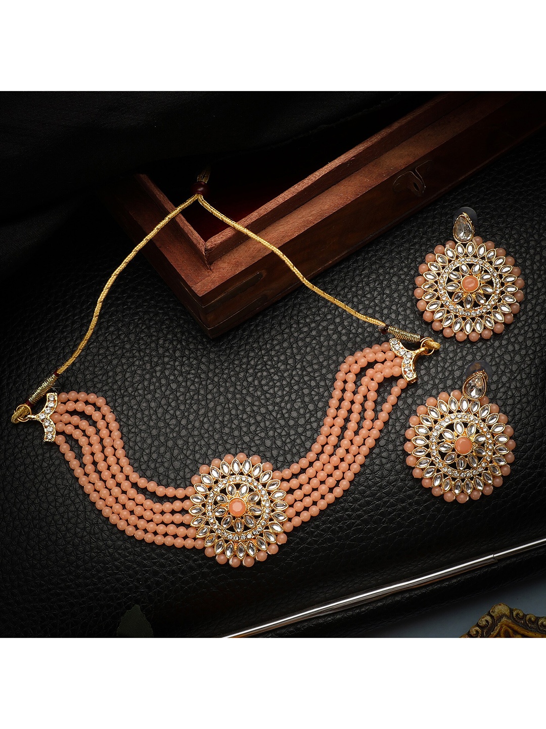 ZaffreCollections Women Gold-Plated Peach & White Crystal-Studded & Beaded Jewellery Set
ZaffreCollections Women Gold-Plated Peach & White Crystal-Studded & Beaded Jewellery Set