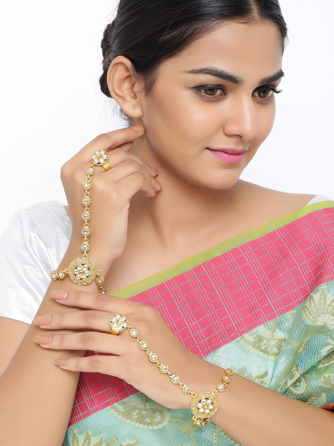 Sanjog Women 2 Gold-Toned & White Brass Kundan Antique Gold-Plated Ring Bracelet
Sanjog Women 2 Gold-Toned & White Brass Kundan Antique Gold-Plated Ring Bracelet
