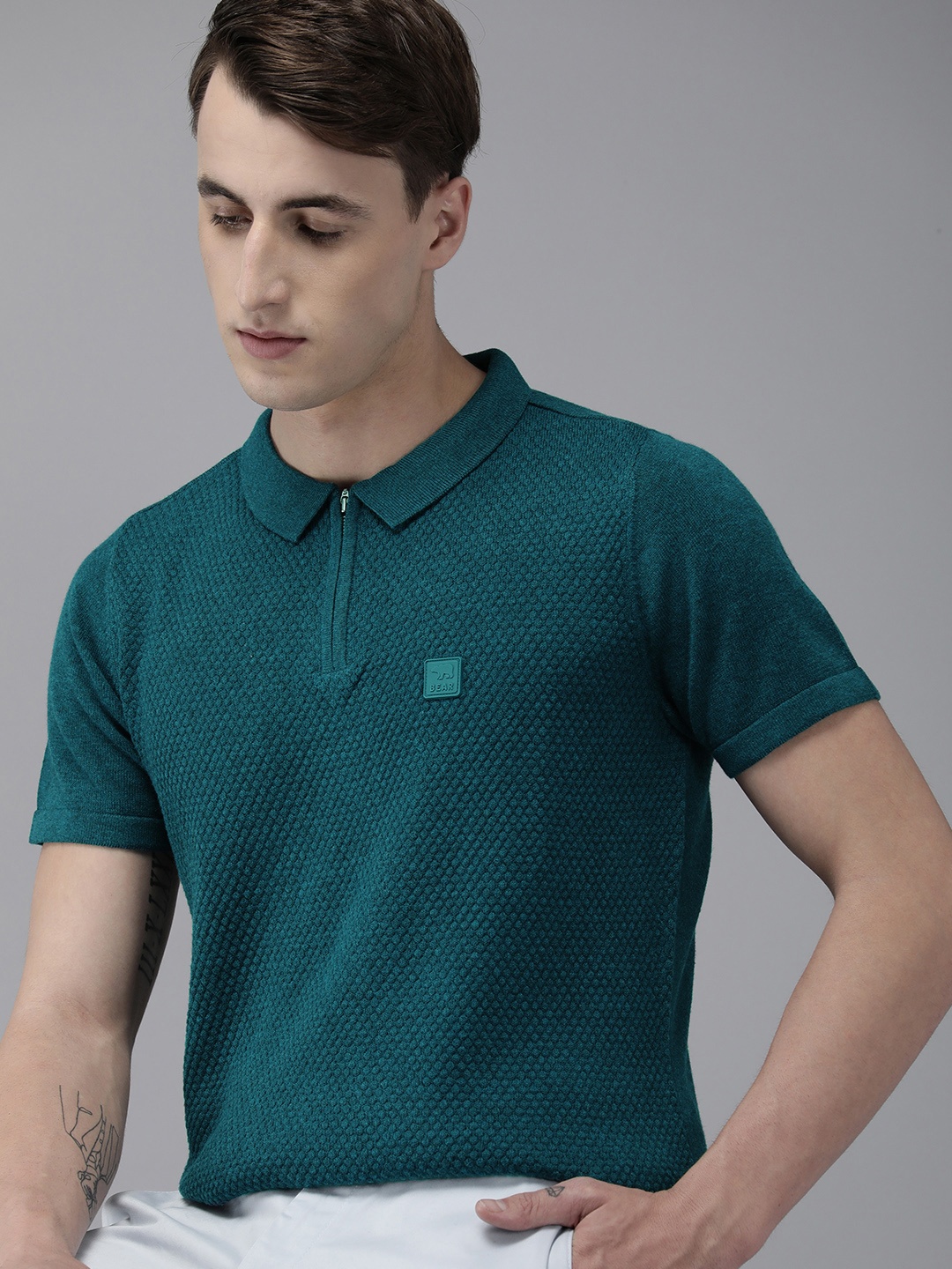 THE BEAR HOUSE Ardor Edition Men Teal Green Self Design Polo Collar Slim Fit T-shirt
THE BEAR HOUSE Ardor Edition Men Teal Green Self Design Polo Collar Slim Fit T-shirt
