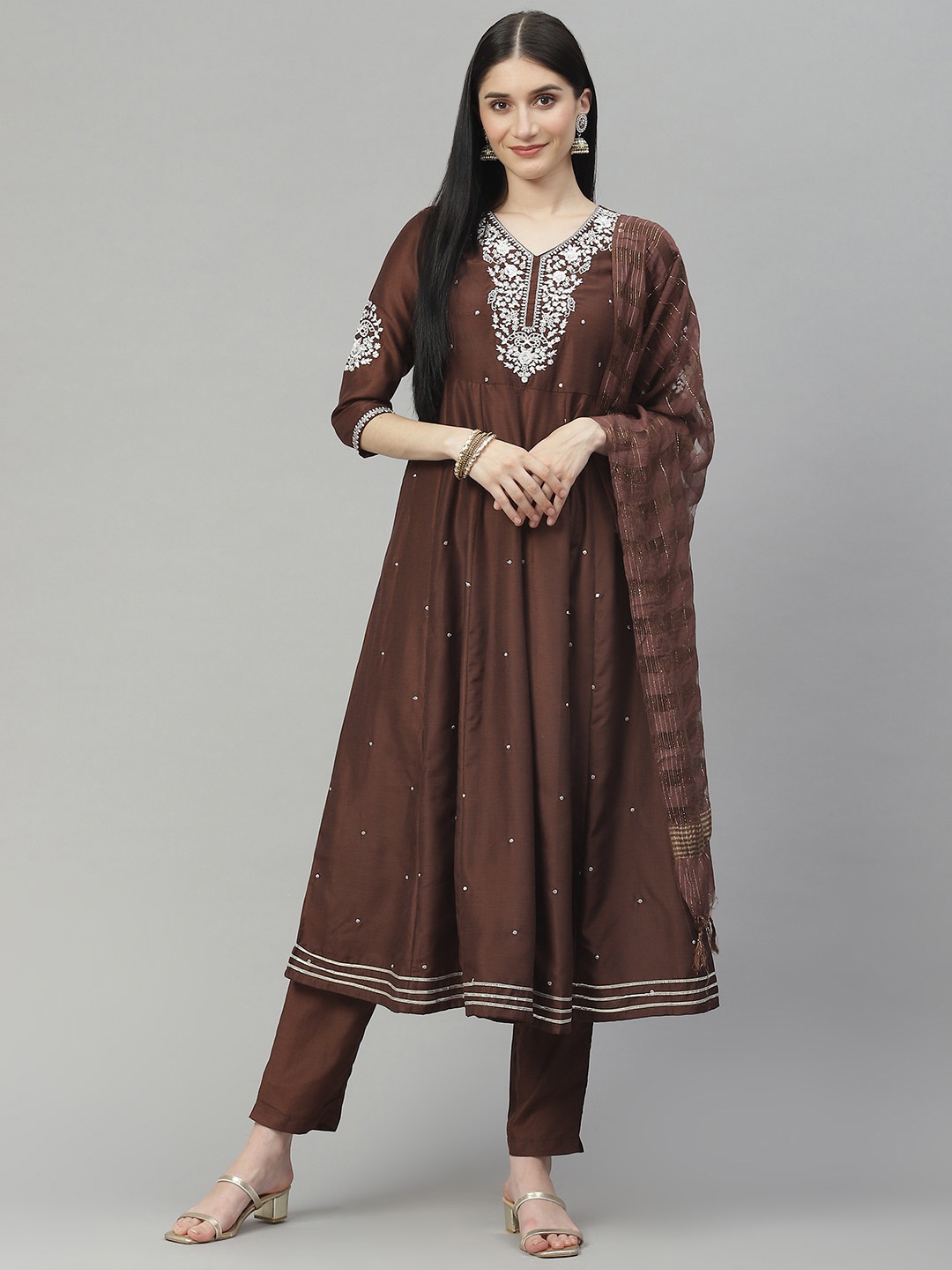 DAAMINA Women Brown Ethnic Motifs Embroidered Thread Work Kurta with Trousers & With Dupatta
DAAMINA Women Brown Ethnic Motifs Embroidered Thread Work Kurta with Trousers & With Dupatta