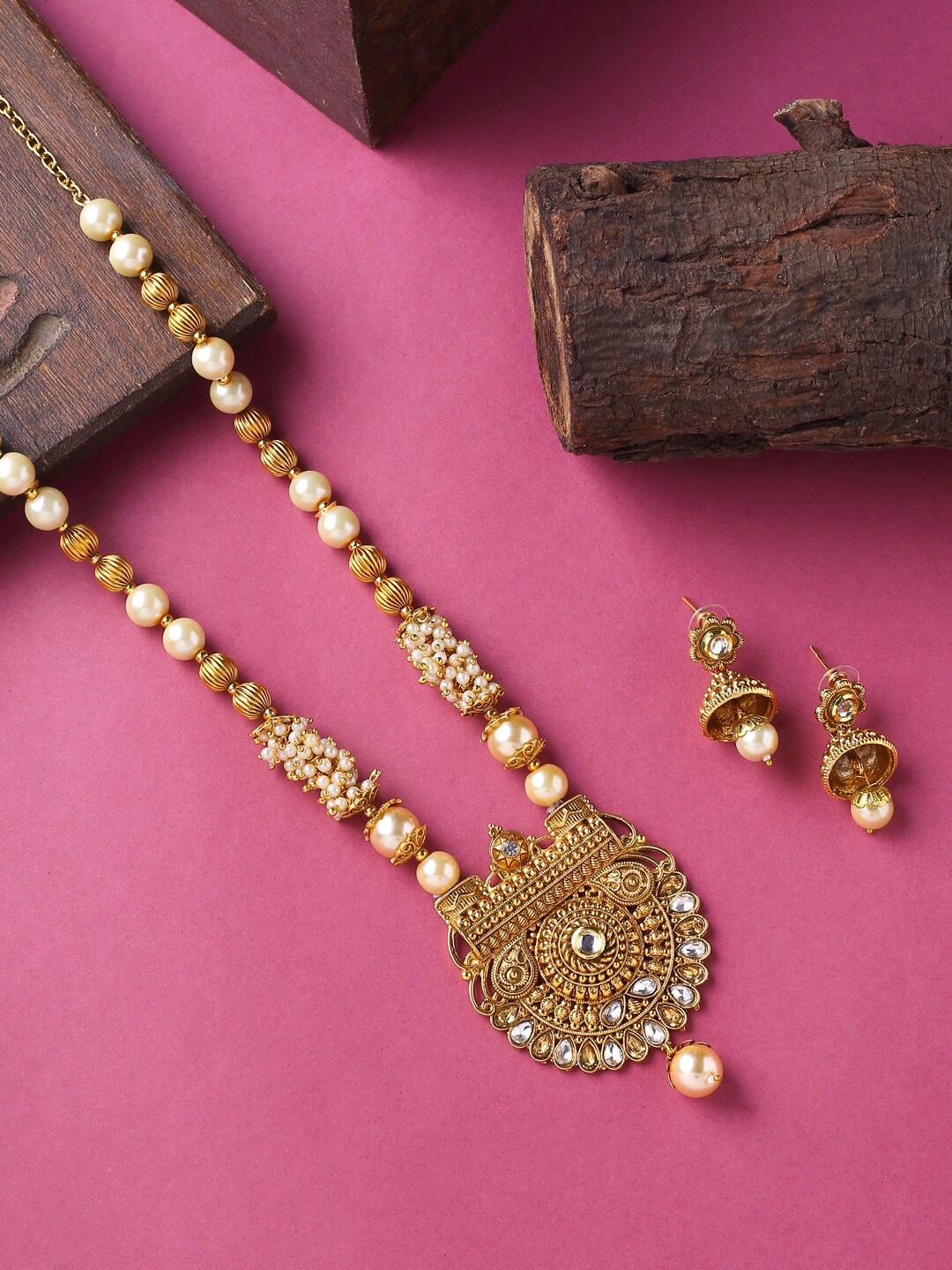 VIRAASI Gold-Plated White Stone-Studded & Pearl Beaded Handcrafted Jewellery Set
VIRAASI Gold-Plated White Stone-Studded & Pearl Beaded Handcrafted Jewellery Set