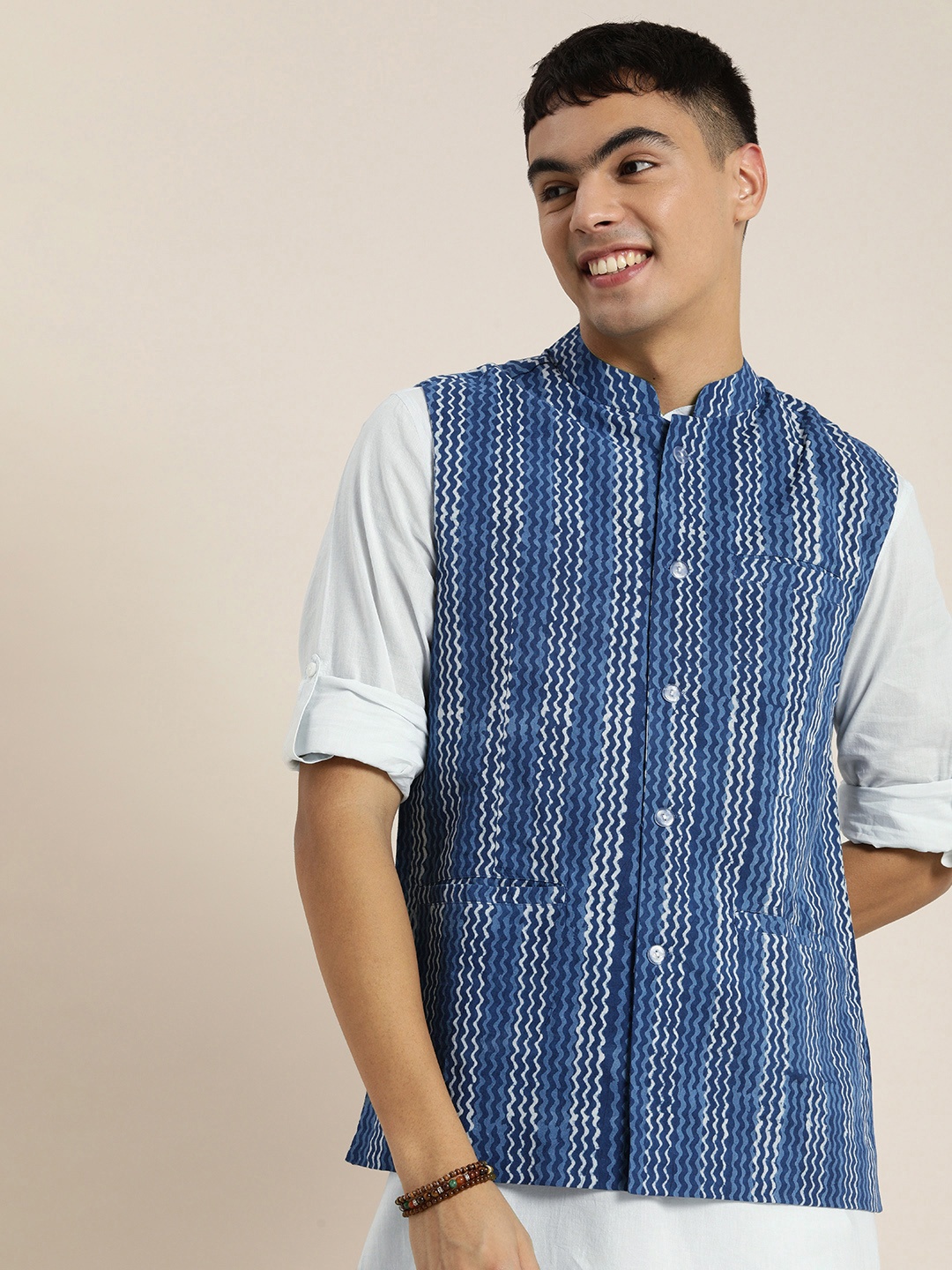 Taavi Men Blue Indigo Printed Pure Cotton 3 Piece Kurta with Pyjamas & Nehru Jacket
Taavi Men Blue Indigo Printed Pure Cotton 3 Piece Kurta with Pyjamas & Nehru Jacket