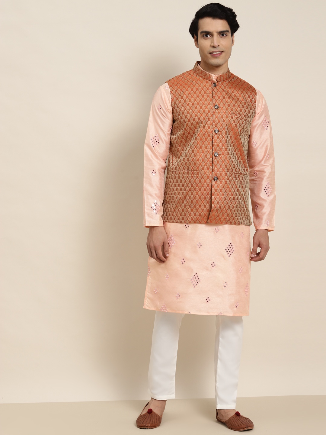 SOJANYA Men Peach-Coloured Ethnic Motifs Mirror Work Kurta with Pyjamas & Nehru Jacket
SOJANYA Men Peach-Coloured Ethnic Motifs Mirror Work Kurta with Pyjamas & Nehru Jacket