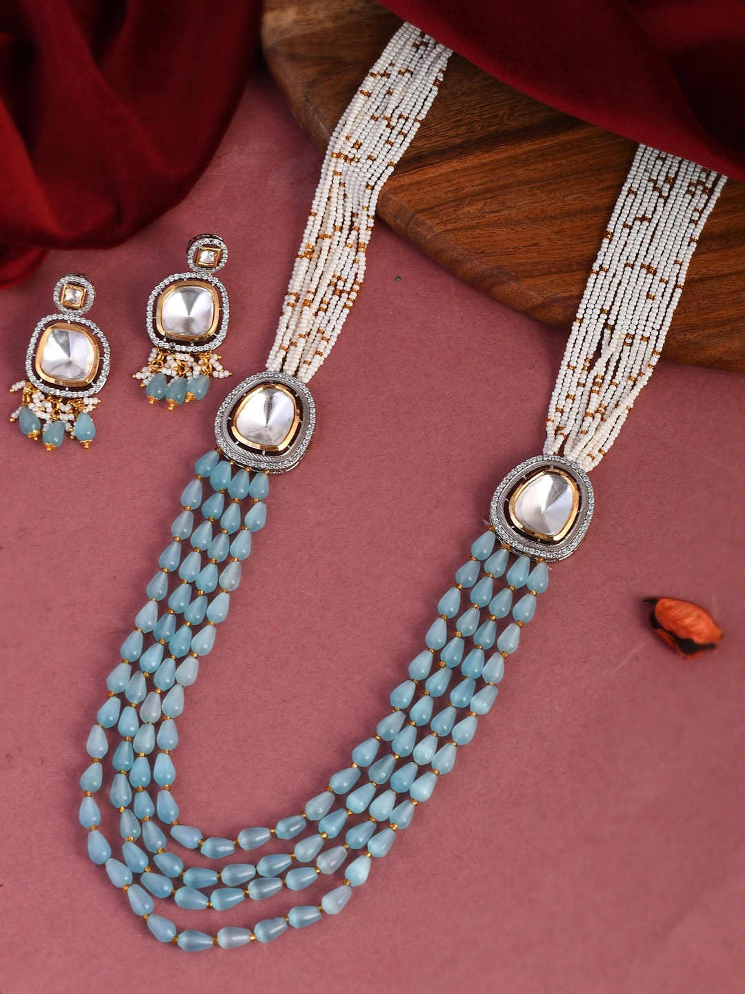 DASTOOR Women Gold-Plated Blue & White Kundan-Studded & Beaded Handcrafted Jewellery Set
DASTOOR Women Gold-Plated Blue & White Kundan-Studded & Beaded Handcrafted Jewellery Set