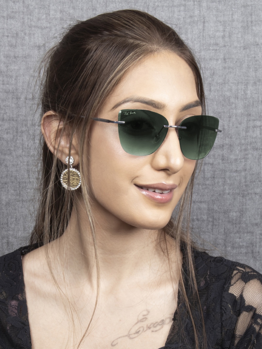 Ted Smith Women Green Lens & Gunmetal-Toned Cateye Sunglasses with UV Protected Lens
Ted Smith Women Green Lens & Gunmetal-Toned Cateye Sunglasses with UV Protected Lens