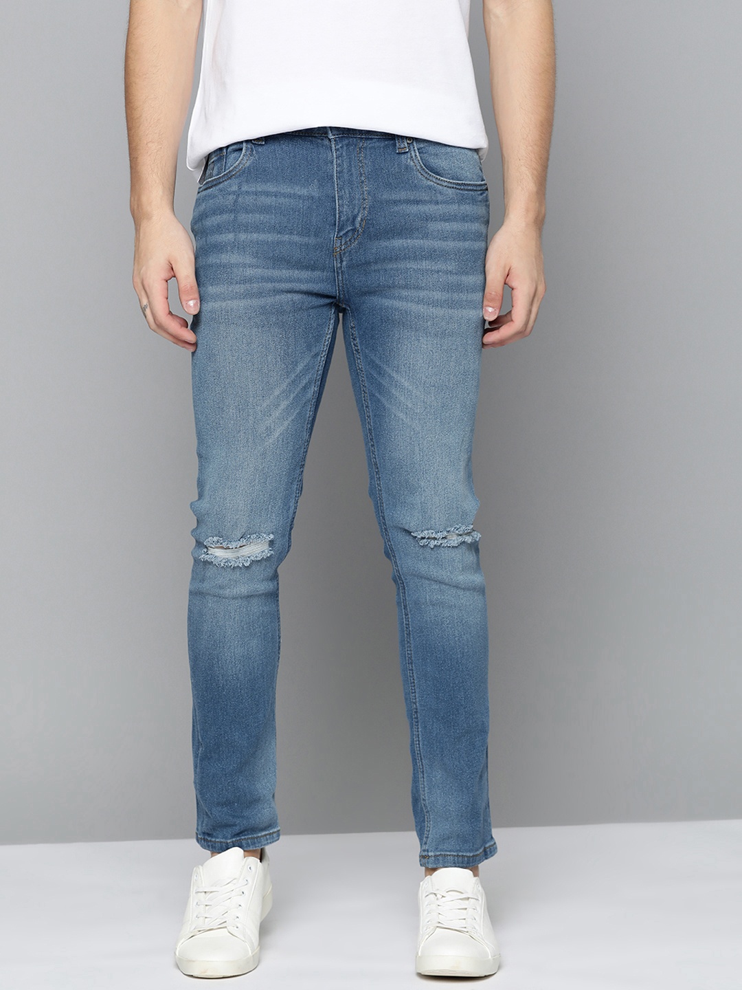 Mast & Harbour Men Blue Skinny Fit Slash Knee Light Fade Logo Printed Stretchable Jeans
Mast & Harbour Men Blue Skinny Fit Slash Knee Light Fade Logo Printed Stretchable Jeans
