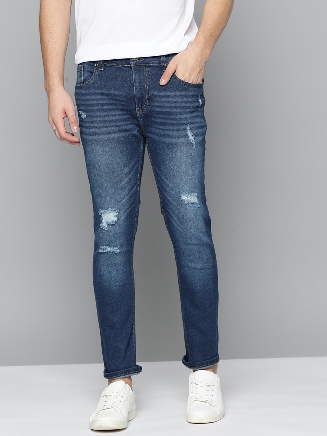 Mast & Harbour Men Navy Blue Skinny Fit Highly Distressed Light Fade Stretchable Jeans
Mast & Harbour Men Navy Blue Skinny Fit Highly Distressed Light Fade Stretchable Jeans