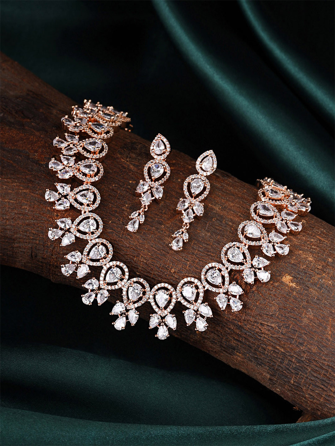 Yellow Chimes Rosegold Plated AD/American Diamond Studded Crystal Jewellery Set, Rose gold
Yellow Chimes Rosegold Plated AD/American Diamond Studded Crystal Jewellery Set, Rose gold