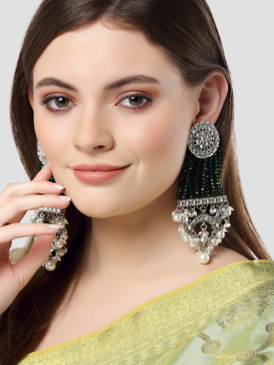 KARATCART Women Oxidised Silver Pearl and Green Crystal Studded Kundan Dangler Earrings
KARATCART Women Oxidised Silver Pearl and Green Crystal Studded Kundan Dangler Earrings