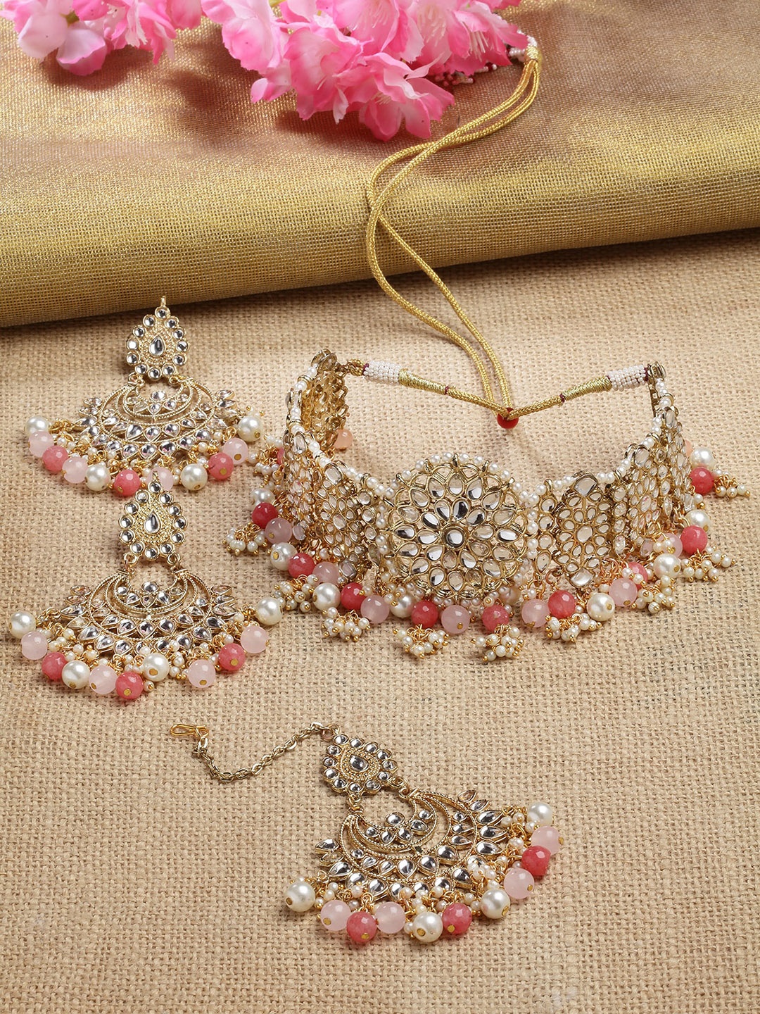 KARATCART Gold-Plated & Peach Coloured Kundan Studded & Beaded Handcrafted Jewellery Set
KARATCART Gold-Plated & Peach Coloured Kundan Studded & Beaded Handcrafted Jewellery Set