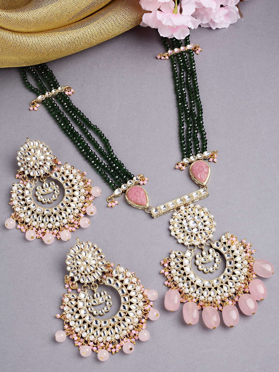 KARATCART Gold-Plated Pink & Green Kundan Studded & Beaded Handcrafted Jewellery Set
KARATCART Gold-Plated Pink & Green Kundan Studded & Beaded Handcrafted Jewellery Set