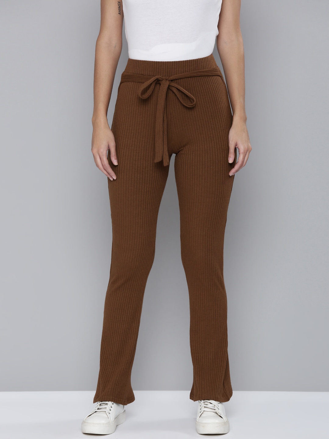 Flying Machine Women Brown Striped Bootcut Mid-Rise Knitted Track Pants With Tie-Up Belt
Flying Machine Women Brown Striped Bootcut Mid-Rise Knitted Track Pants With Tie-Up Belt