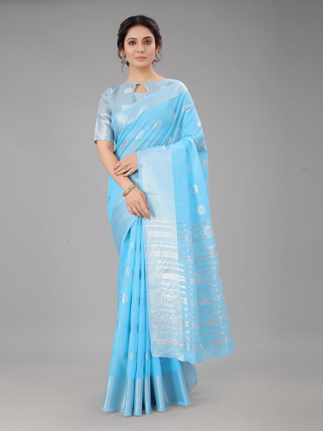 FASHDEAL Blue & Silver-Toned Woven Design Zari Linen Blend Saree With Blouse Piece
FASHDEAL Blue & Silver-Toned Woven Design Zari Linen Blend Saree With Blouse Piece