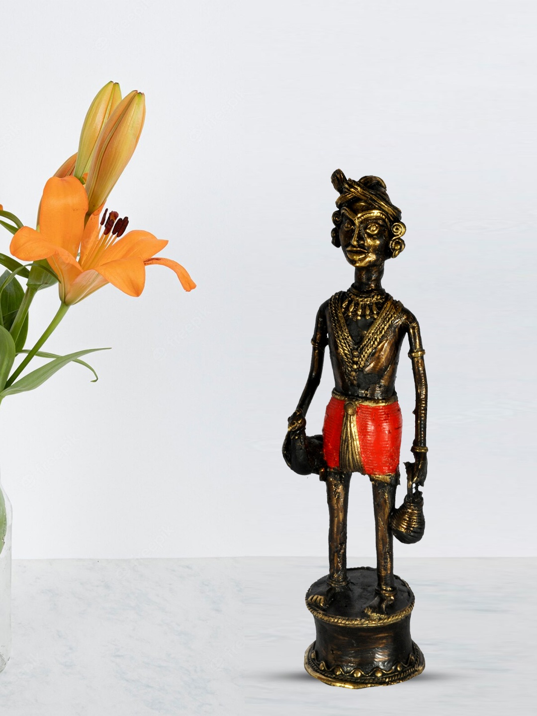 SHREE KALA HOME DECOR Bronze-Toned & Red Textured Tribal Man With Chicken Showpieces
SHREE KALA HOME DECOR Bronze-Toned & Red Textured Tribal Man With Chicken Showpieces