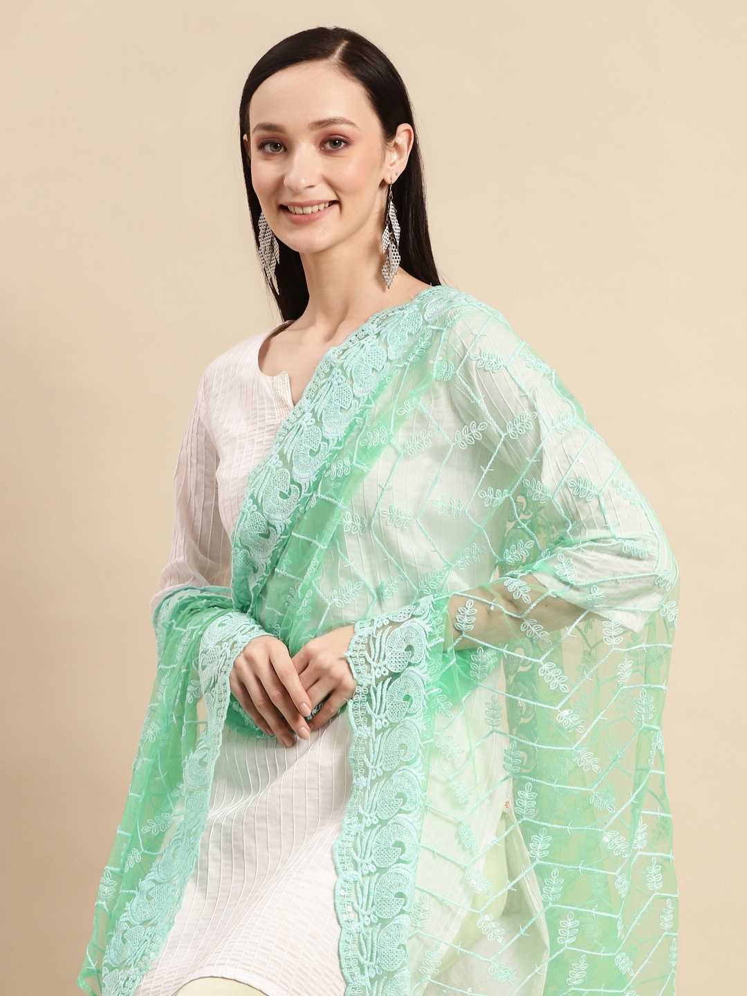 Saadgi Sea Green & Silver-Coloured Ethnic Motifs Embroidered Chikankari Sequin Dupatta
Saadgi Sea Green & Silver-Coloured Ethnic Motifs Embroidered Chikankari Sequin Dupatta