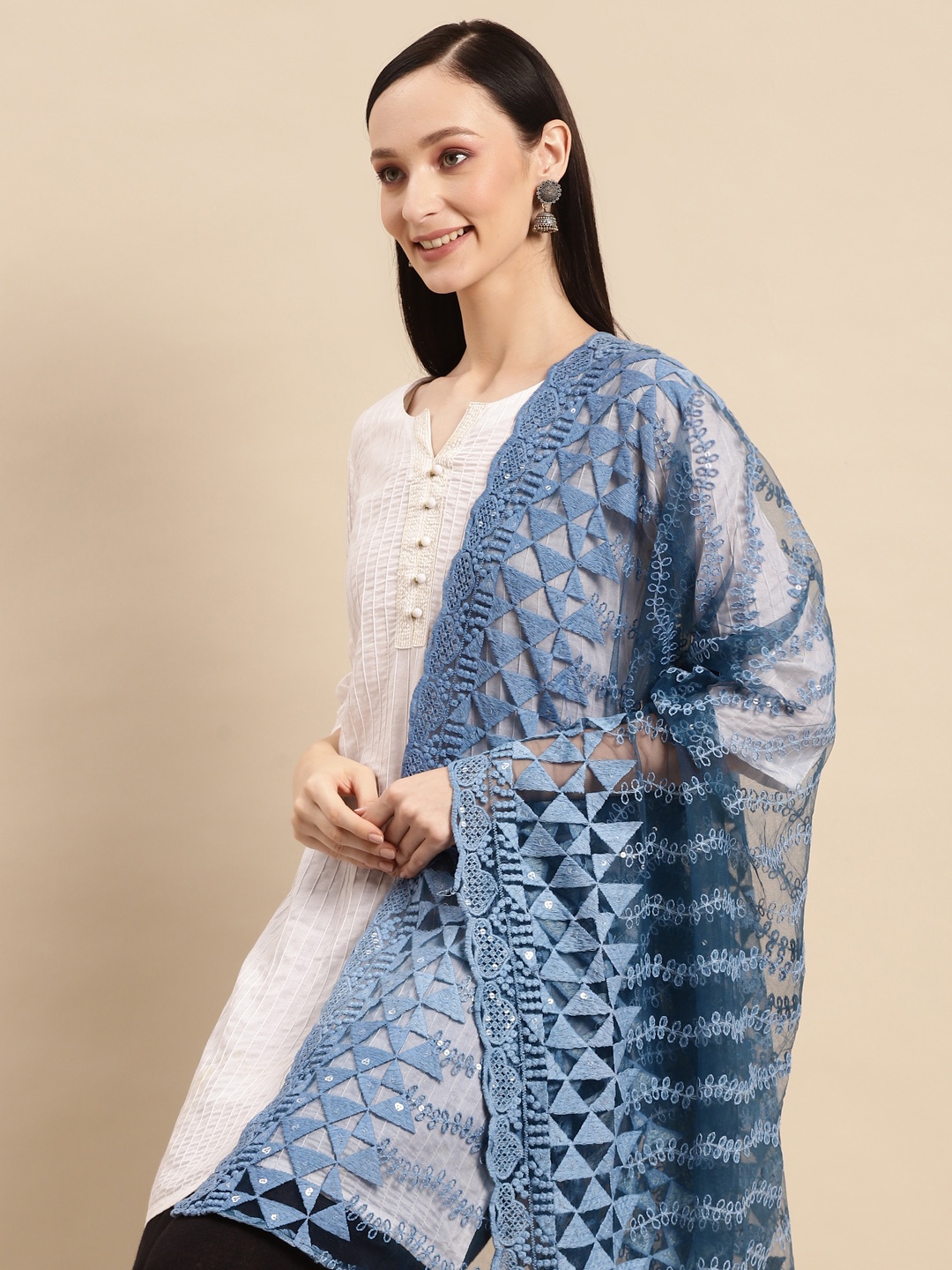 Saadgi Teal Blue & Silver-Coloured Ethnic Motifs Embroidered Chikankari Sequin Dupatta
Saadgi Teal Blue & Silver-Coloured Ethnic Motifs Embroidered Chikankari Sequin Dupatta