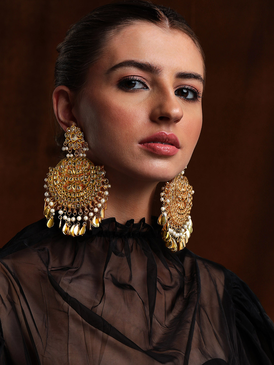 Rubans 18K Gold-Plated White Kundan Studded Big Chandbali Earrings with Pearl & Gold Drop
Rubans 18K Gold-Plated White Kundan Studded Big Chandbali Earrings with Pearl & Gold Drop