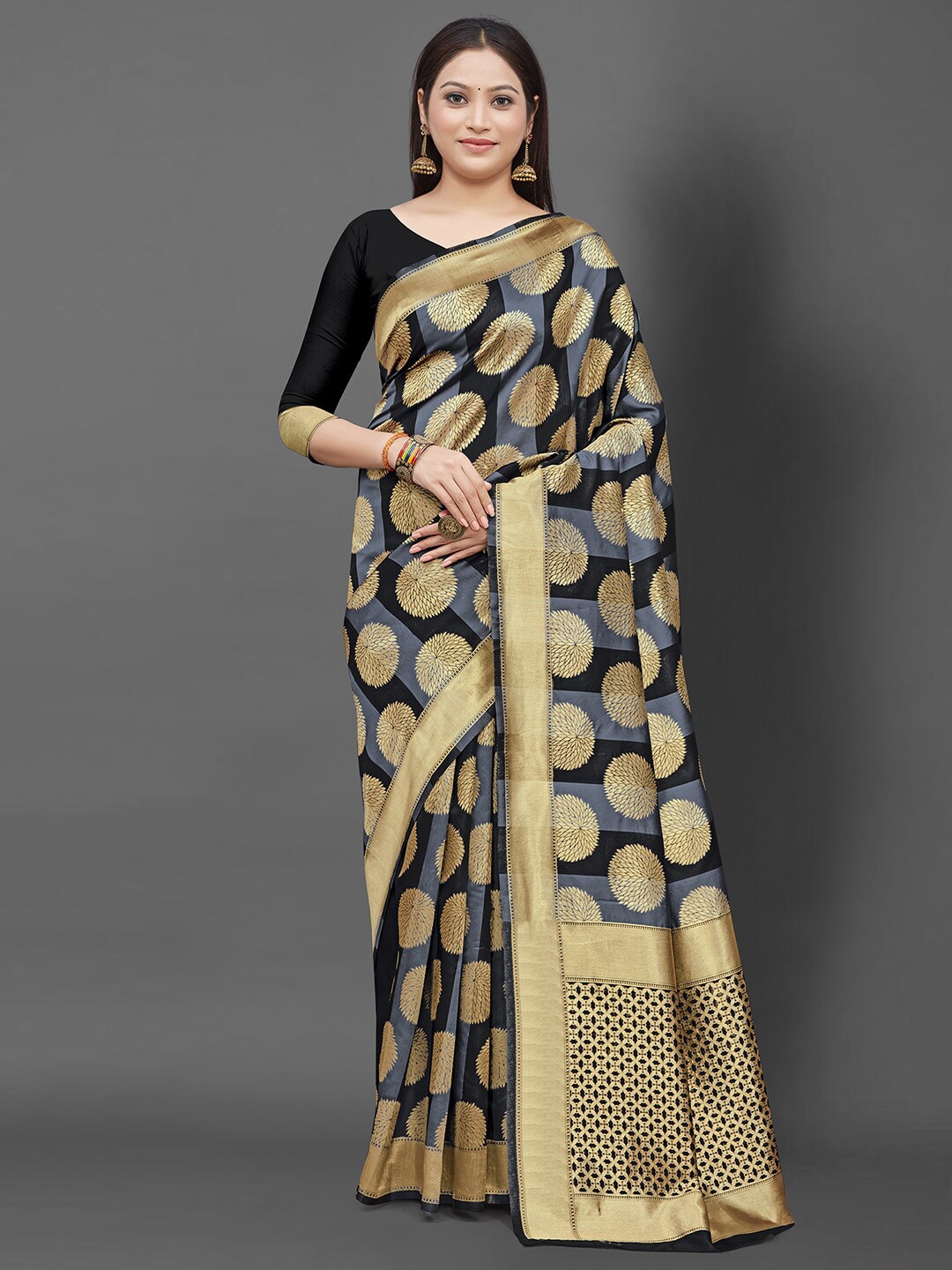 KALINI Grey & Gold-Toned Ethnic Motifs Zari Silk Blend Banarasi Saree with Matching Blouse
KALINI Grey & Gold-Toned Ethnic Motifs Zari Silk Blend Banarasi Saree with Matching Blouse