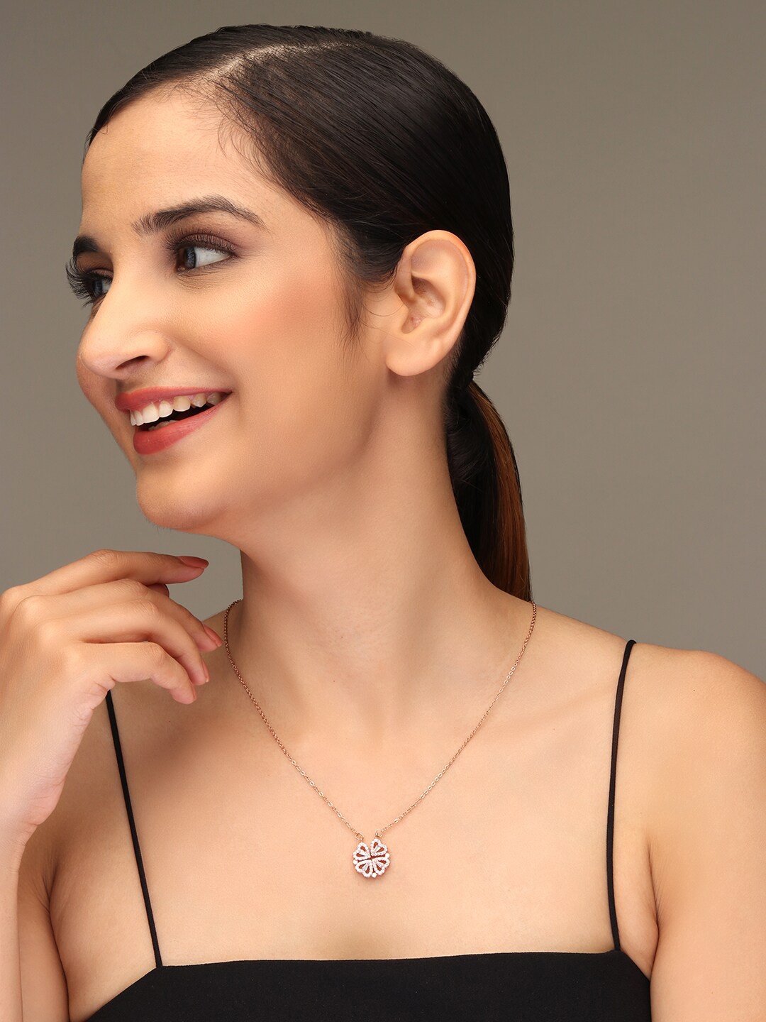 LAIDA Women Rose Gold-Plated & White AD-Stone Studded Openable-Shaped Pendant With Chain
LAIDA Women Rose Gold-Plated & White AD-Stone Studded Openable-Shaped Pendant With Chain
