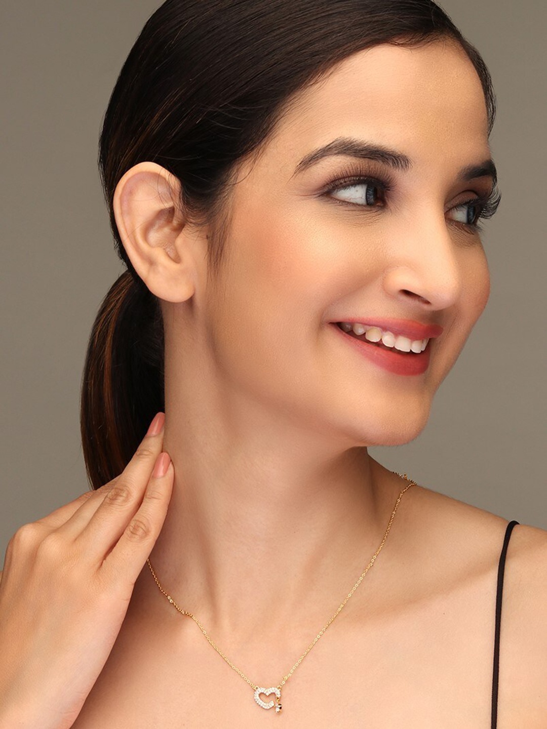 LAIDA Women Gold-Plated & White AD-Stone Studded Broken Heart-Shaped Pendant With Chain
LAIDA Women Gold-Plated & White AD-Stone Studded Broken Heart-Shaped Pendant With Chain