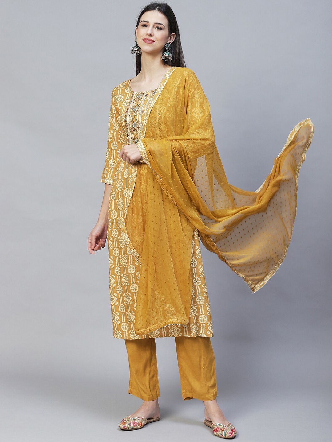 FASHOR Women Mustard Yellow Ethnic Motifs Mirror Work Kurta with Trousers & Dupatta
FASHOR Women Mustard Yellow Ethnic Motifs Mirror Work Kurta with Trousers & Dupatta