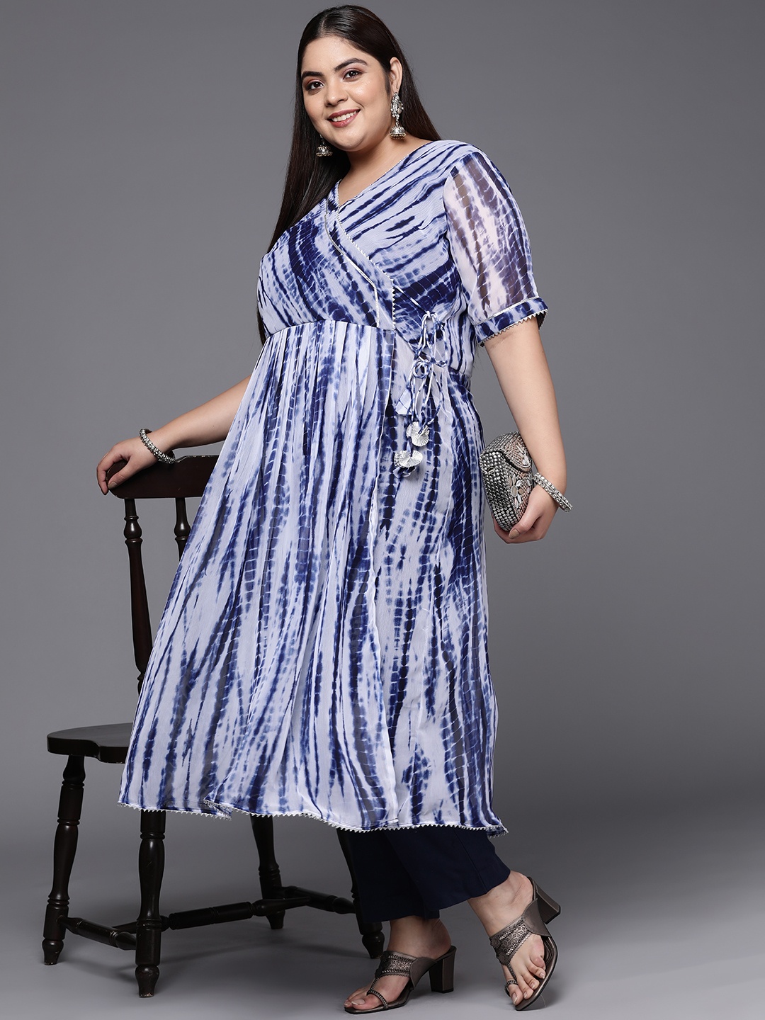 INDDUS PLUS Women Blue Dyed Angrakha Gotta Patti Anarkali Kurta with Trousers
INDDUS PLUS Women Blue Dyed Angrakha Gotta Patti Anarkali Kurta with Trousers
