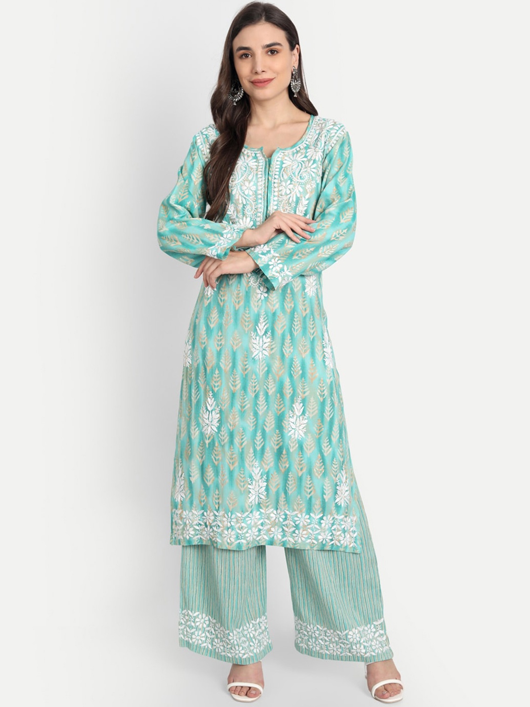 Indiankala4u Women Sea Green Floral Embroidered Pleated Chikankari Kurta with Palazzos
Indiankala4u Women Sea Green Floral Embroidered Pleated Chikankari Kurta with Palazzos