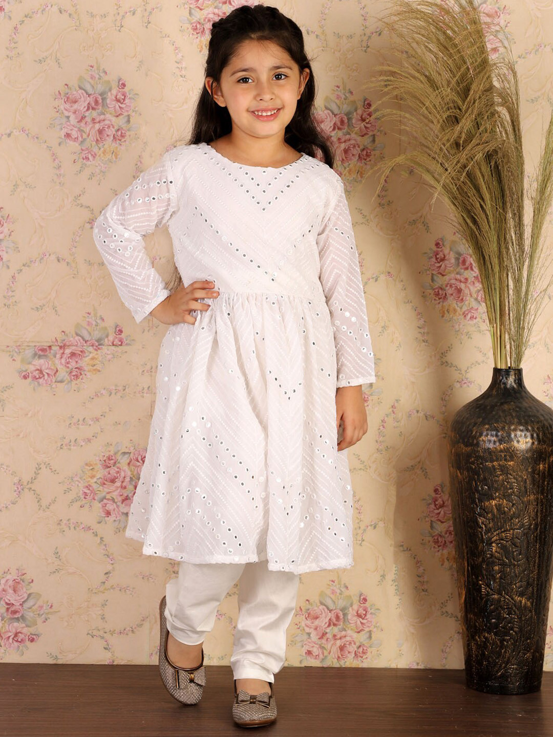 SHRESTHA BY VASTRAMAY Girls White Embroidered Empire Mirror Work Kurta with Churidar 
SHRESTHA BY VASTRAMAY Girls White Embroidered Empire Mirror Work Kurta with Churidar