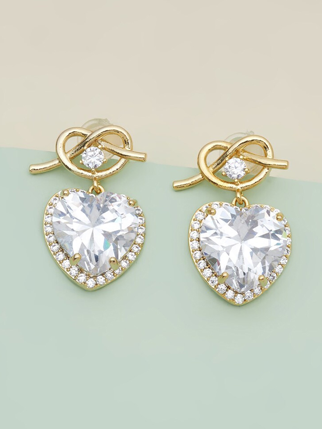 Kushal's Fashion Jewellery Gold-Plated & White Cubic Zirconia Heart Shaped Drop Earrings
Kushal's Fashion Jewellery Gold-Plated & White Cubic Zirconia Heart Shaped Drop Earrings